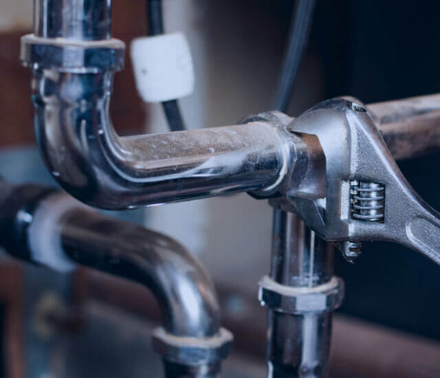 Plumbing Services – Carlsbad Home Services Plumber performing residential plumbing services in Carlsbad home